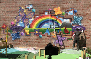 westchester community foundation brick wall with whimsical joyful grafitti